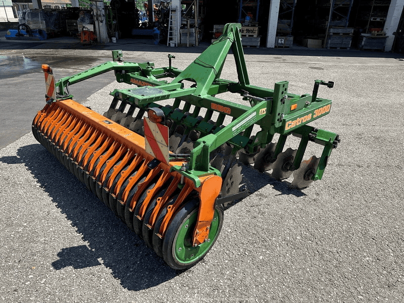 Дискова борона AMAZONE Catros разом із ТРАКТОРОМ колісним John Deere 8370R